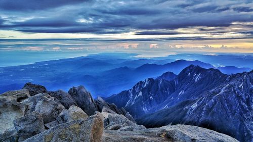 Scenic view of mountains against sky during sunset