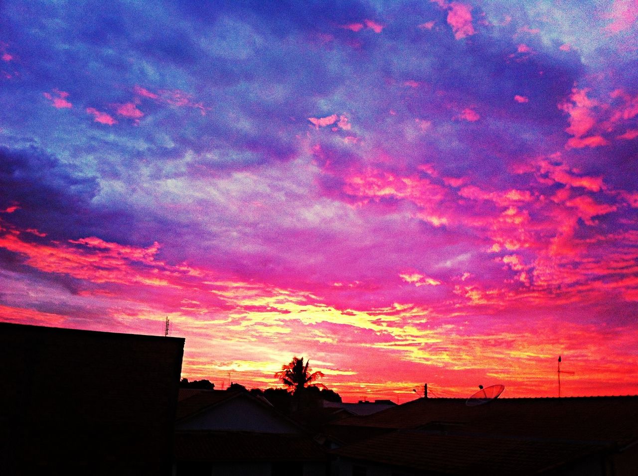 sunset, silhouette, sky, orange color, cloud - sky, beauty in nature, scenics, building exterior, built structure, dramatic sky, architecture, house, nature, tranquility, low angle view, tranquil scene, cloud, idyllic, dusk, cloudy