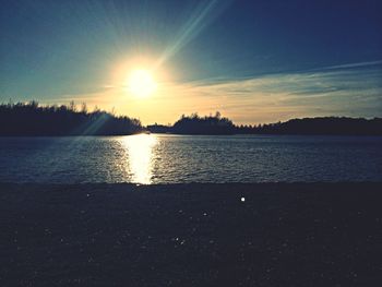 Scenic view of sunset over river