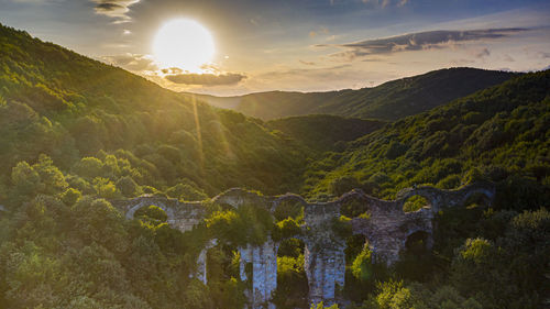 Scenic view of mountains against sky during sunset