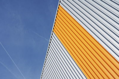 Low angle view of building against blue sky