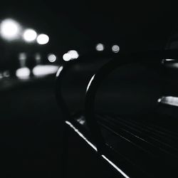 Illuminated train at night