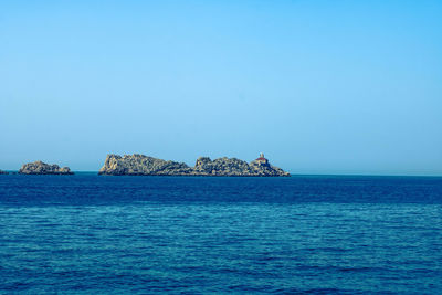 Scenic view of sea against clear sky