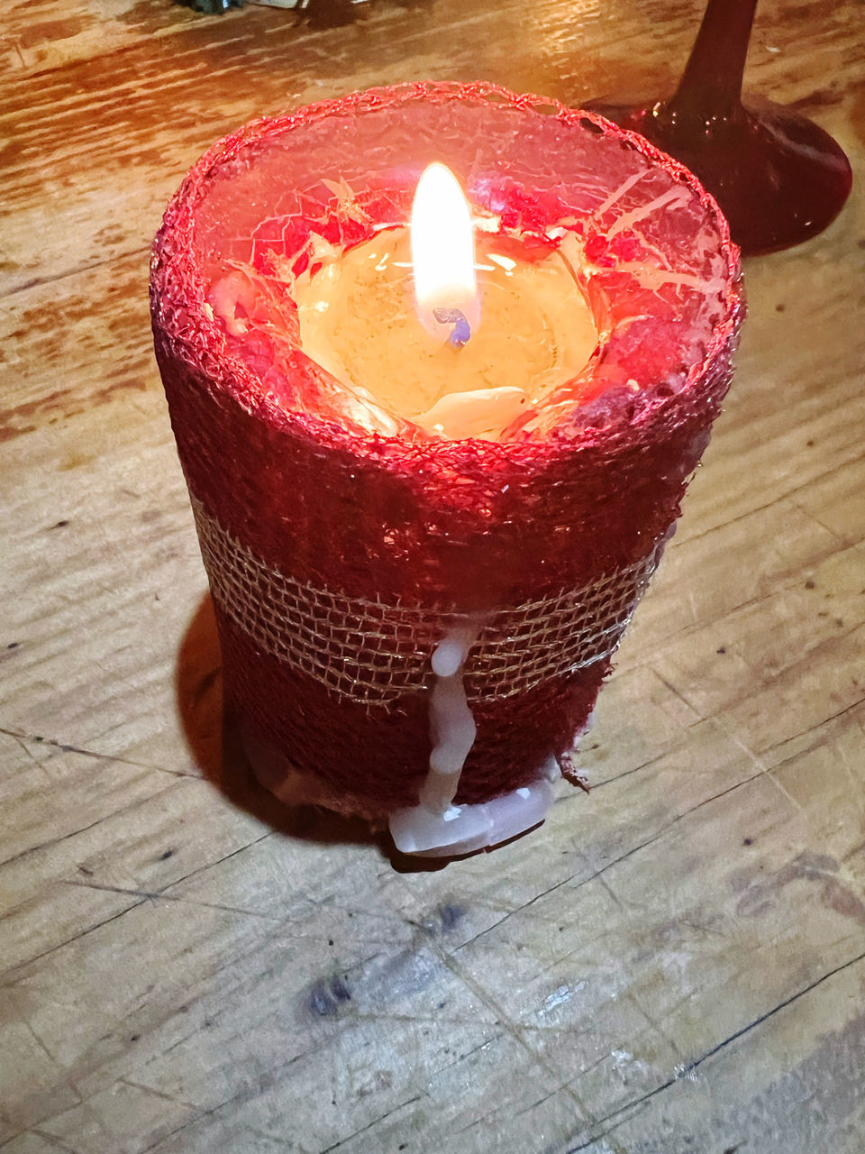candle, flame, fire, burning, red, wood, heat, lighting, table, indoors, high angle view, nature, no people, close-up, food and drink, illuminated, pink, decoration, glowing, food, celebration