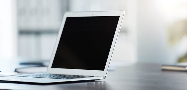 Close-up of laptop on table