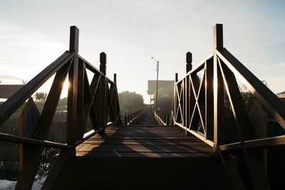 View of footbridge against sky