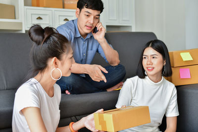 Smiling colleagues working at office