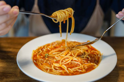 Close-up of noodles in plate on table