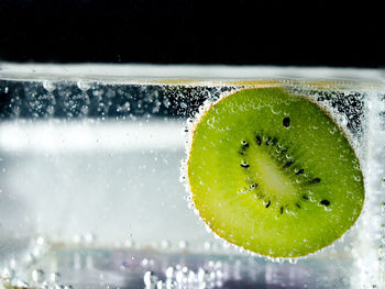 Close-up of water drops on glass