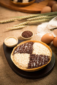 High angle view of murtabak with chocolate and sesame on tablecloth