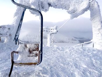 Snow covered ski lift during winter