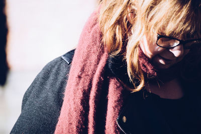 Close-up of young woman wearing eyeglasses