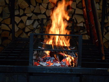 Close-up of bonfire on wood