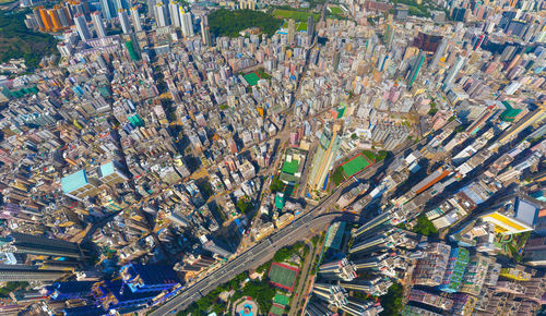 High angle view of street amidst buildings in city