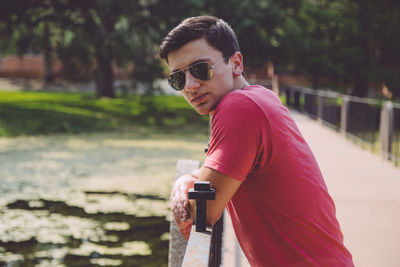 Portrait of man on bridge