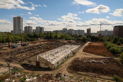 Panoramic shot of buildings in city against sky