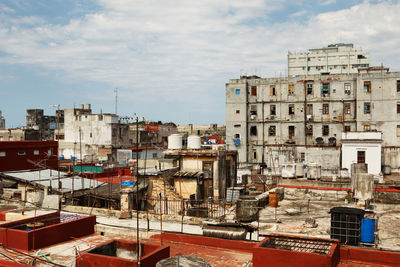 Buildings in city against sky