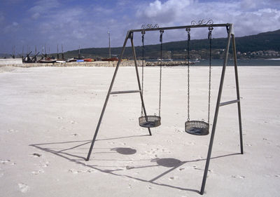 High angle view of swing on beach