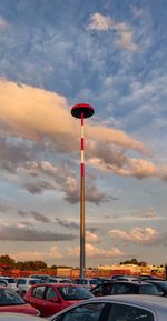 Low angle view of street light against sky during sunset