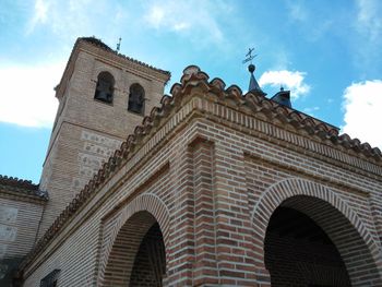 Low angle view of historic building against sky