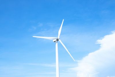 Low angle view of wind turbine against sky