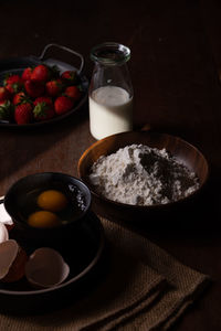 Flour, eggs and strawberries 