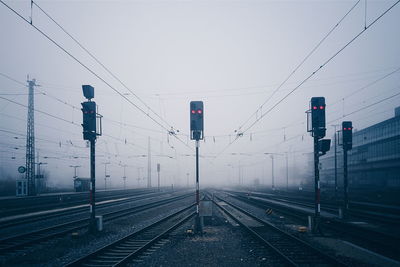 Railway tracks against clear sky