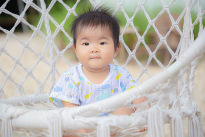 Portrait of cute girl standing outdoors