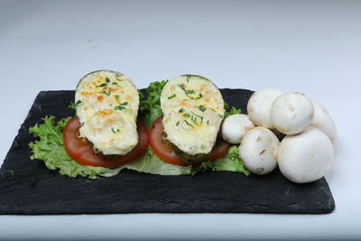 Close-up of food served on table