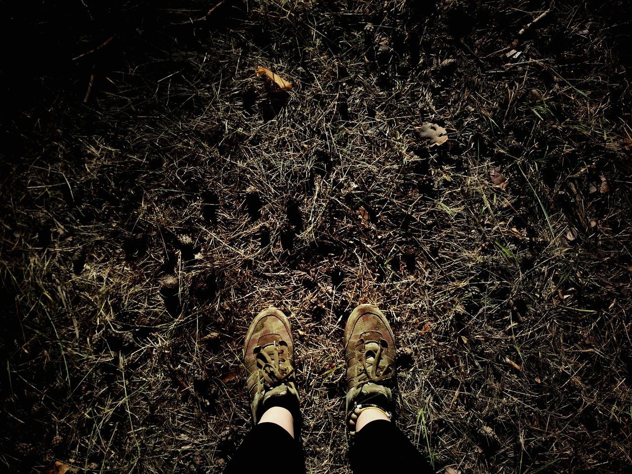 low section, person, shoe, personal perspective, standing, night, lifestyles, unrecognizable person, high angle view, men, leisure activity, human foot, footwear, street, part of, outdoors