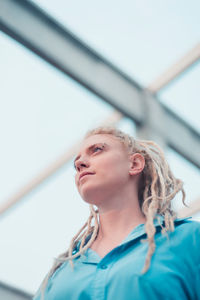 Portrait of young woman looking away