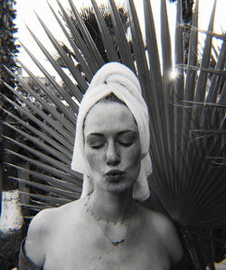 Close-up portrait of shirtless man