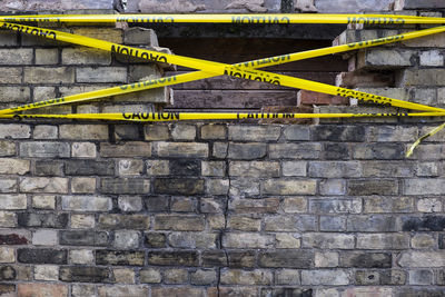 Text on brick wall