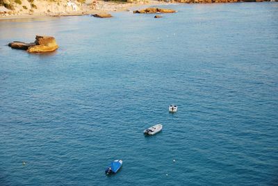 High angle view of swimming boats in sea