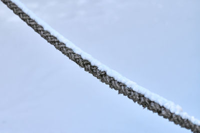 Low angle view of snow against sky