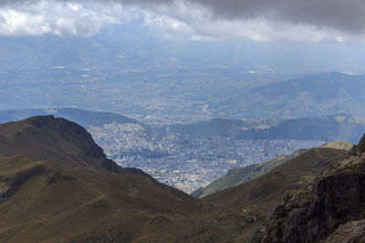 Scenic view of landscape and mountains against sky