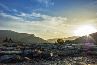 Scenic view of rocky mountains against sky. sunrise over jebel akhmatova mountain range in oman