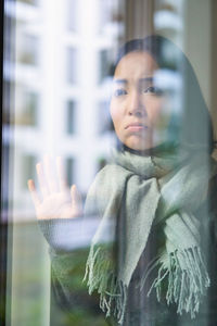 Portrait of young woman looking away