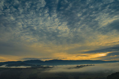 Scenic view of dramatic sky during sunset