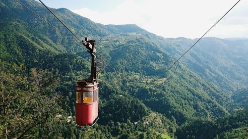 Overhead cable car over mountain