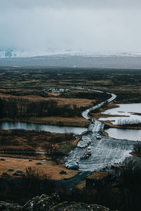 High angle view of river against sky during winter