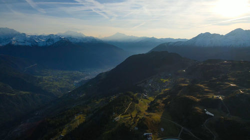 Scenic view of mountains against sky during sunset