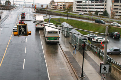 High angle view of vehicles on road in city