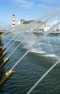 Fountains with jets of water at the sea entrance to the city of malmo sweden