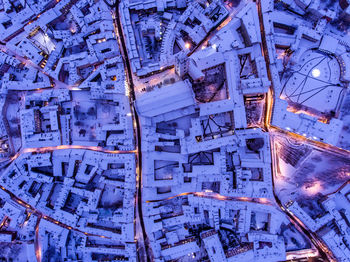 Aerial view of city buildings during winter