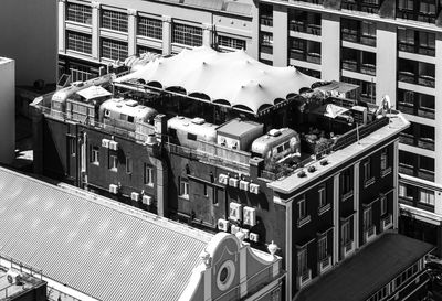 High angle view of buildings in city and rooftop camping