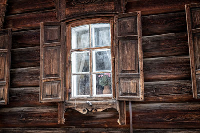 Low angle view of window in house