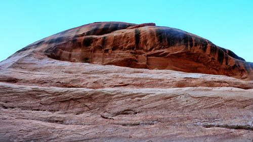 Scenic view of desert against clear sky