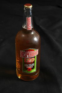 Close-up of beer bottle on table