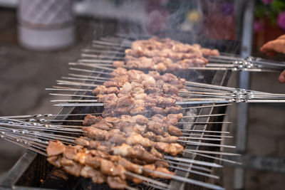 Close-up of meat on barbecue grill